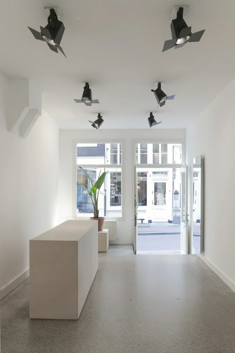 Remove all the hanging clothes on the right